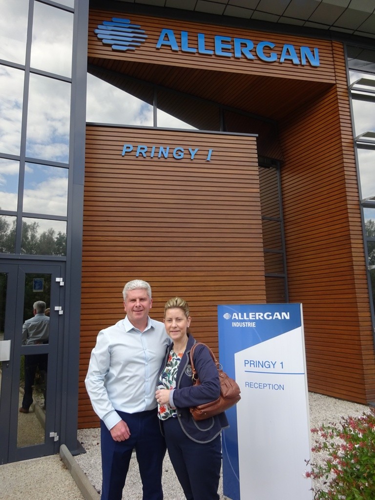 Ashley and Janet Lewis standing outside Allergan Facilities , Pringy South of France